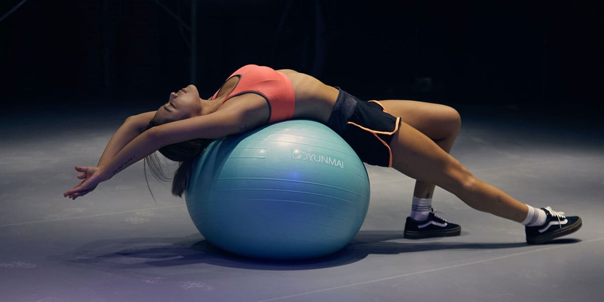 Crossfit athlete with exercise ball